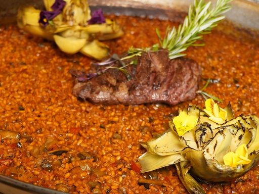 Mediterranean paella with vegetables and meat
