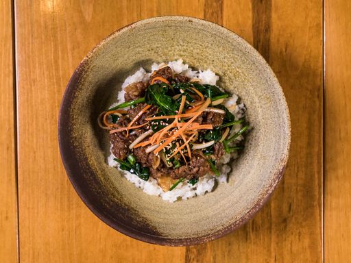 Korean bulgogi beef rice bowl photographed from above.