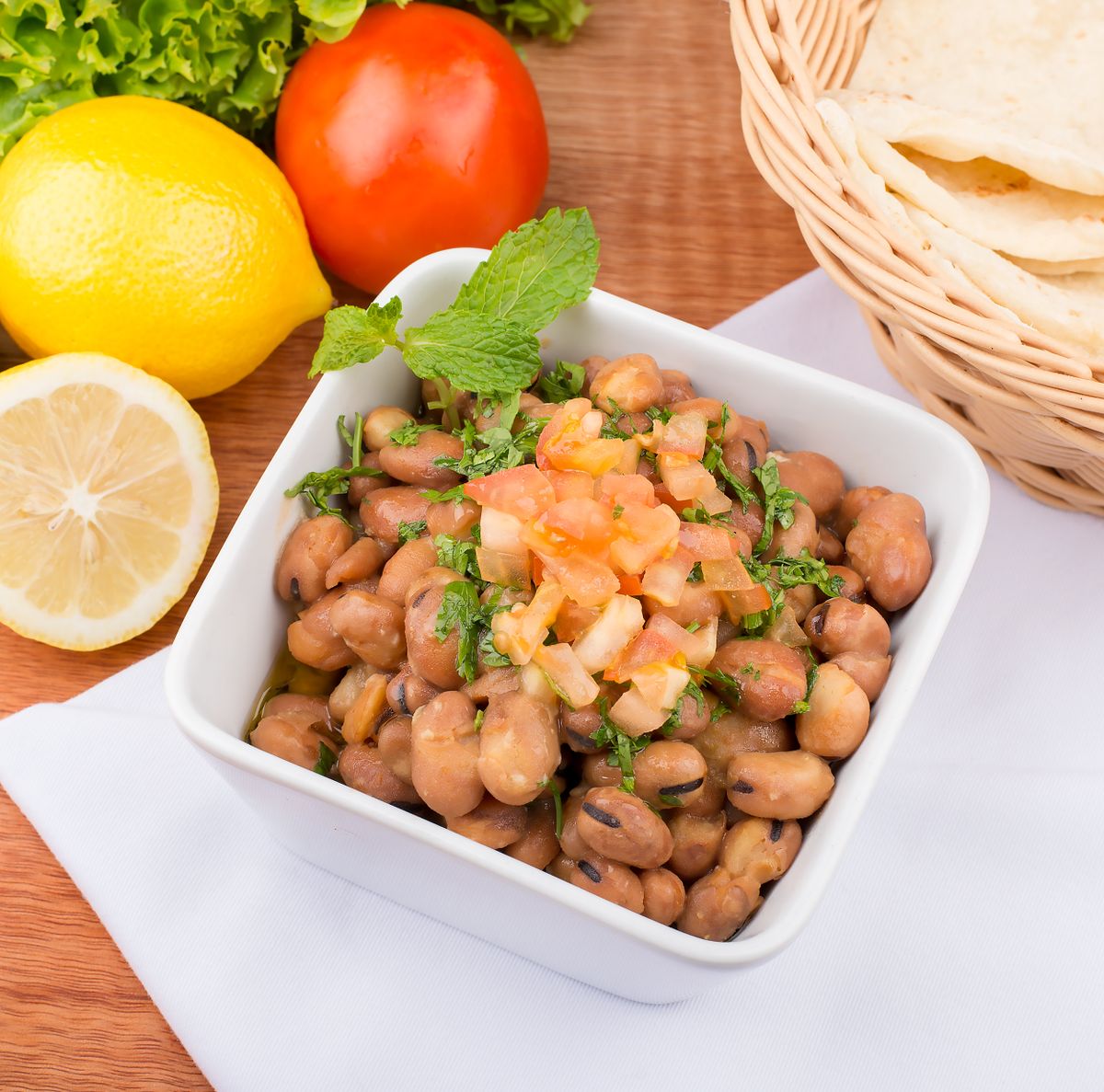 Mediterranean fava bean salad with lemon, tomatoes, and herbs.
