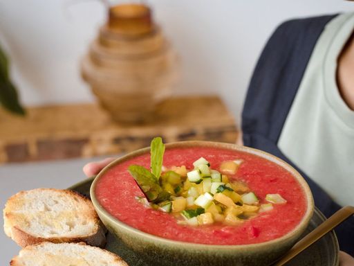 Tomato gazpacho served with toasted bread.