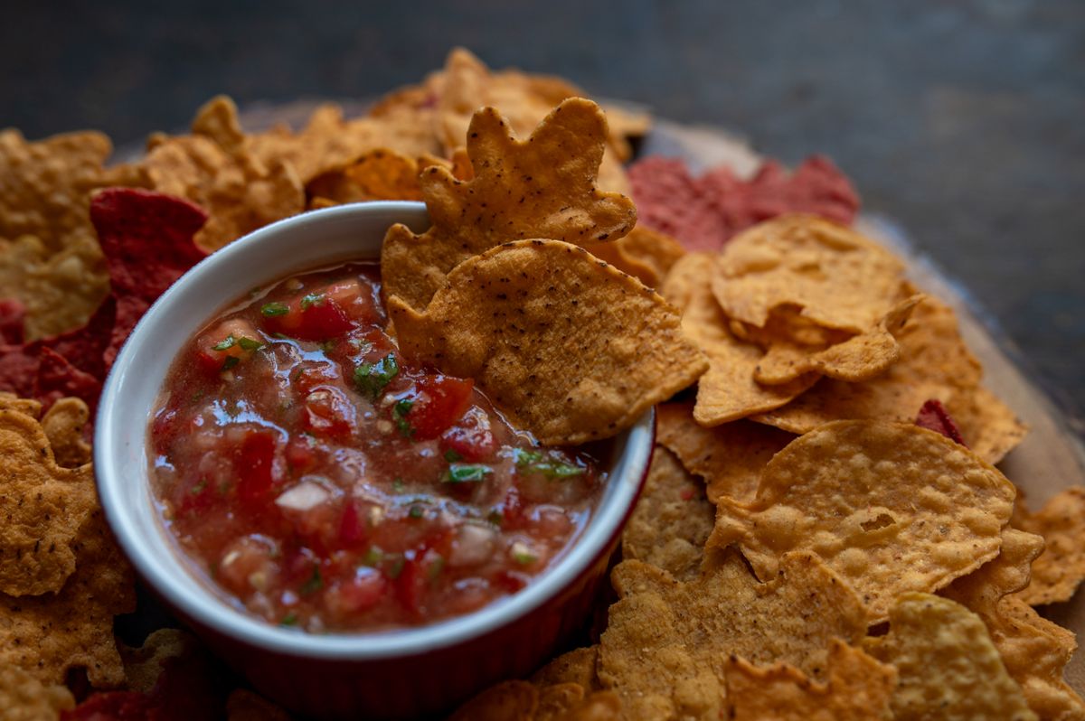 Tortilla chips served with fresh salsa.