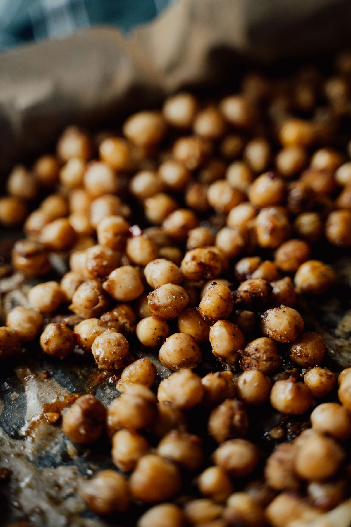 Roasted chickpeas on a baking tray.